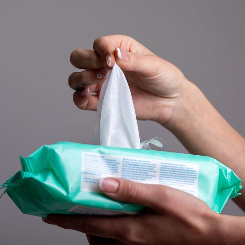 Taking baby wet wipes from the packaging
